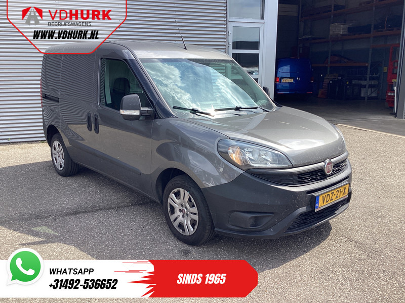 Fiat Dobló Cargo 1.6 MJ 105 pk 3Pers./ Airco/ Cruise/ Navi/ Trekhaak - فان المدمجة: صورة 1 Fiat Dobló Cargo 1.6 MJ 105 pk 3Pers./ Airco/ Cruise/ Navi/ Trekhaak - فان المدمجة: صورة 1