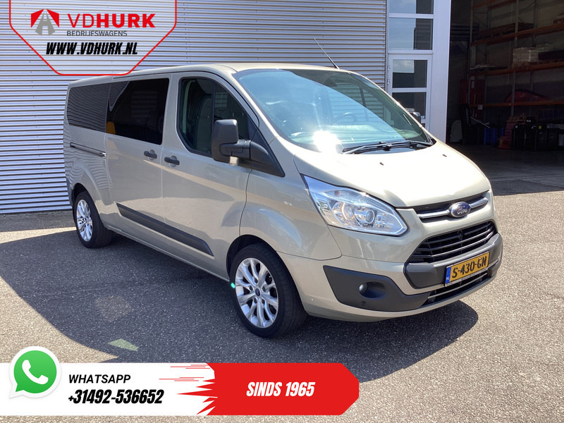 Ford Transit Custom Tourneo 2.0 TDCI 130 pk L2 EXPORT ONLY EUR6 9 Pers/ 9P/ Airco/ Cruise/ PDC/ LMV/ Trekhaak - حافلة صغيرة, ميكروباص: صورة 1 Ford Transit Custom Tourneo 2.0 TDCI 130 pk L2 EXPORT ONLY EUR6 9 Pers/ 9P/ Airco/ Cruise/ PDC/ LMV/ Trekhaak - حافلة صغيرة, ميكروباص: صورة 1