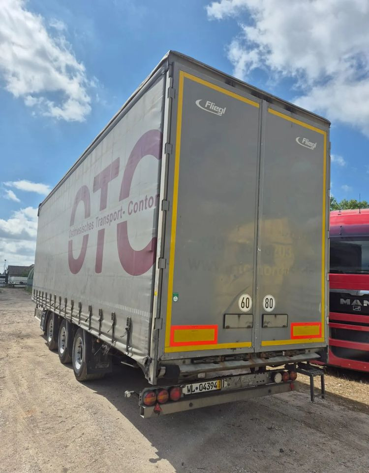 Fliegl Tandem 3 osie - مقطورة ستارة جانبية: صورة 4 Fliegl Tandem 3 osie - مقطورة ستارة جانبية: صورة 4