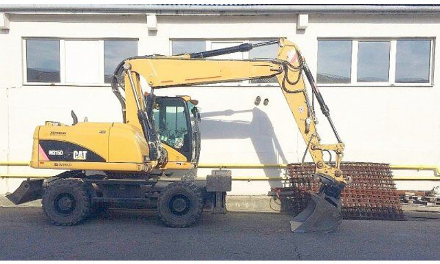 Caterpillar M 315 D - حفارة دولاب: صورة 2 Caterpillar M 315 D - حفارة دولاب: صورة 2
