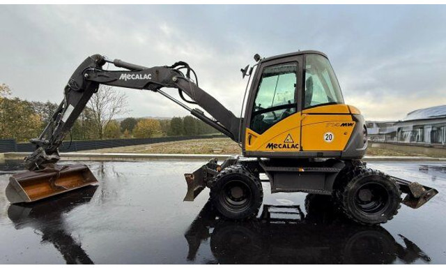 Mecalac 714 MW - حفارة دولاب: صورة 1 Mecalac 714 MW - حفارة دولاب: صورة 1