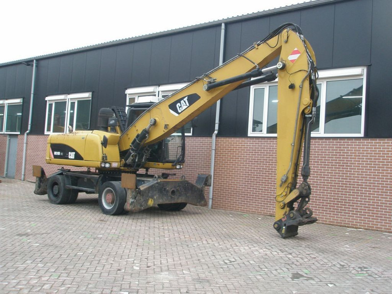 Caterpillar M318D - حفارة دولاب: صورة 3 Caterpillar M318D - حفارة دولاب: صورة 3