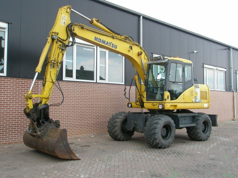 Komatsu PW140-7 - حفارة دولاب: صورة 1 Komatsu PW140-7 - حفارة دولاب: صورة 1