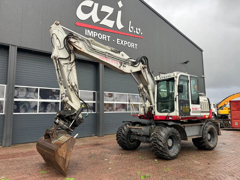 Takeuchi TB1160W - حفارة دولاب: صورة 1 Takeuchi TB1160W - حفارة دولاب: صورة 1