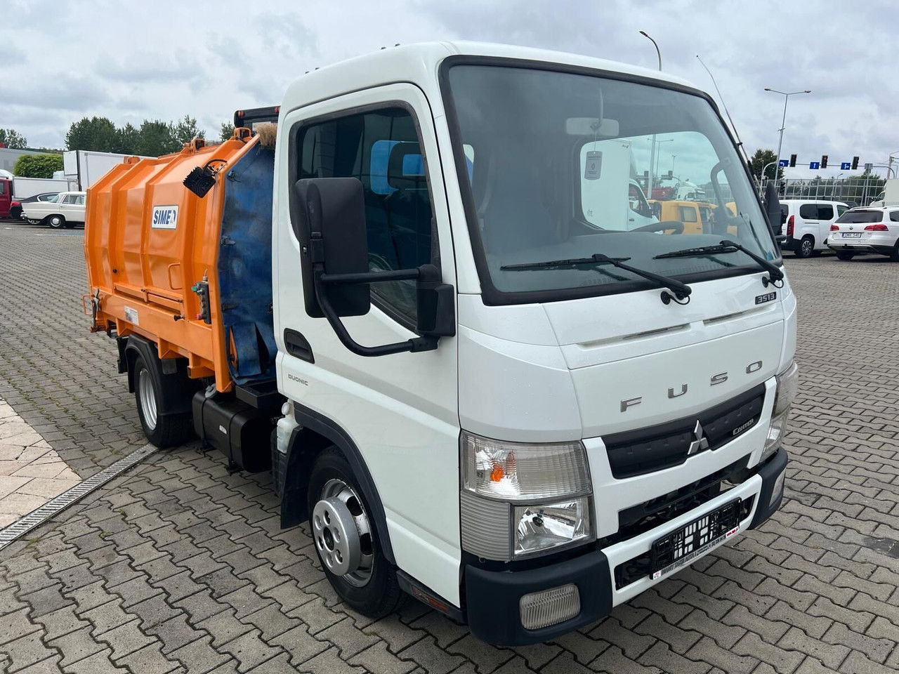Mitsubishi Canter Fuso 3S13 AMT / Presscontainer / LOW KM / Super Condition - شاحنة النفايات: صورة 2 Mitsubishi Canter Fuso 3S13 AMT / Presscontainer / LOW KM / Super Condition - شاحنة النفايات: صورة 2