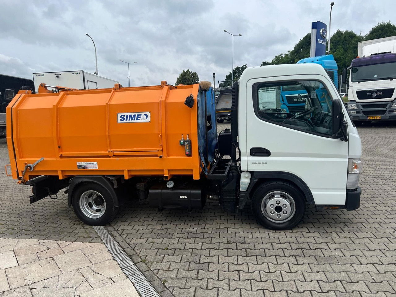 Mitsubishi Canter Fuso 3S13 AMT / Presscontainer / LOW KM / Super Condition - شاحنة النفايات: صورة 3 Mitsubishi Canter Fuso 3S13 AMT / Presscontainer / LOW KM / Super Condition - شاحنة النفايات: صورة 3