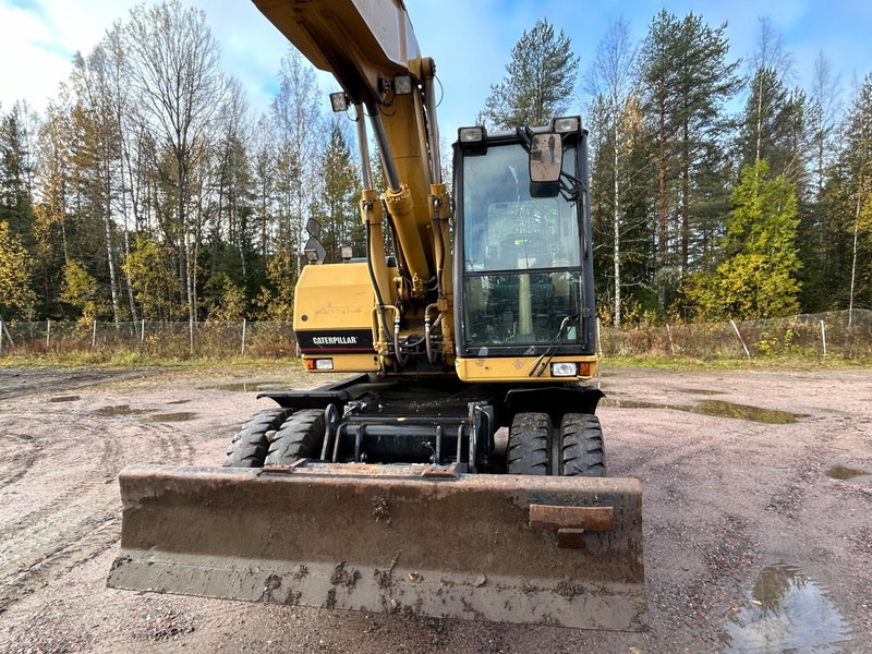 Caterpillar M312 Engcon EC20 tiltrotator - حفارة دولاب: صورة 3 Caterpillar M312 Engcon EC20 tiltrotator - حفارة دولاب: صورة 3