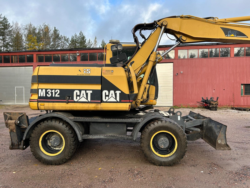 Caterpillar M312 Engcon EC20 tiltrotator - حفارة دولاب: صورة 5 Caterpillar M312 Engcon EC20 tiltrotator - حفارة دولاب: صورة 5
