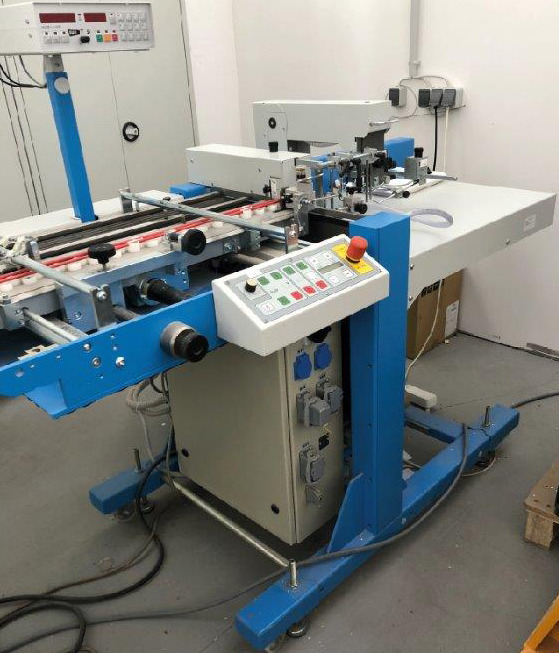 GUK / Bäuerle FL 50-2 flat stack suction air feeder - آلة الطي: صورة 1 GUK / Bäuerle FL 50-2 flat stack suction air feeder - آلة الطي: صورة 1