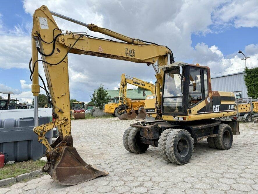 CAT M318 - حفارة دولاب: صورة 2 CAT M318 - حفارة دولاب: صورة 2