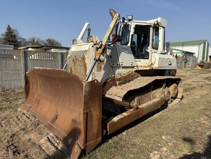 Komatsu D65EX-15e0 + ripper - جرافة: صورة 1 Komatsu D65EX-15e0 + ripper - جرافة: صورة 1