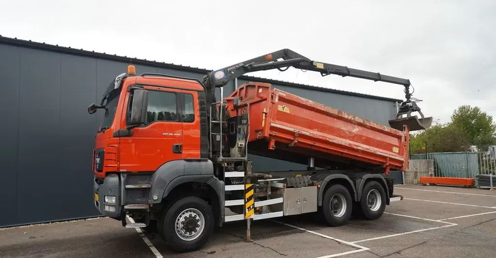 MAN TGS 28.400 / 6x6 / WYWROTKA 2-STRONNA Z HDS HMF 1643 Z2/ EURO 5 - شاحنة قلاب: صورة 1 MAN TGS 28.400 / 6x6 / WYWROTKA 2-STRONNA Z HDS HMF 1643 Z2/ EURO 5 - شاحنة قلاب: صورة 1