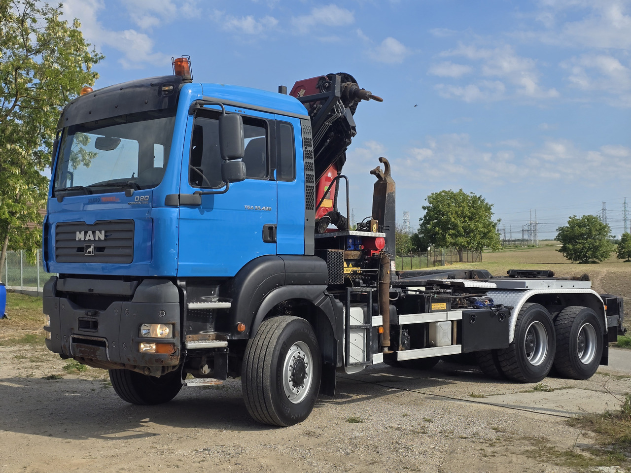 MAN TGA 33.430 6X6 / HMF 1823 K3+REM.CON./ HOOK SYSTEM 2x in stock - شاحنة ذات خطاف, شاحنة كرين: صورة 3 MAN TGA 33.430 6X6 / HMF 1823 K3+REM.CON./ HOOK SYSTEM 2x in stock - شاحنة ذات خطاف, شاحنة كرين: صورة 3