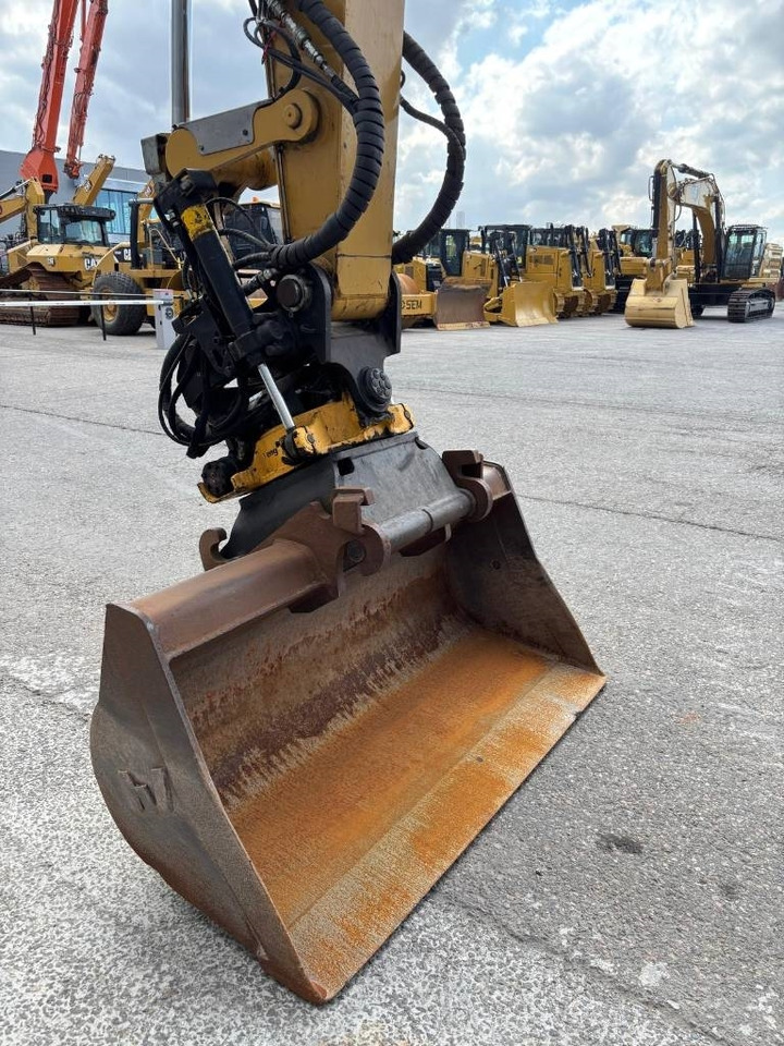 حفارة دولاب CAT M 313 D: صورة 10