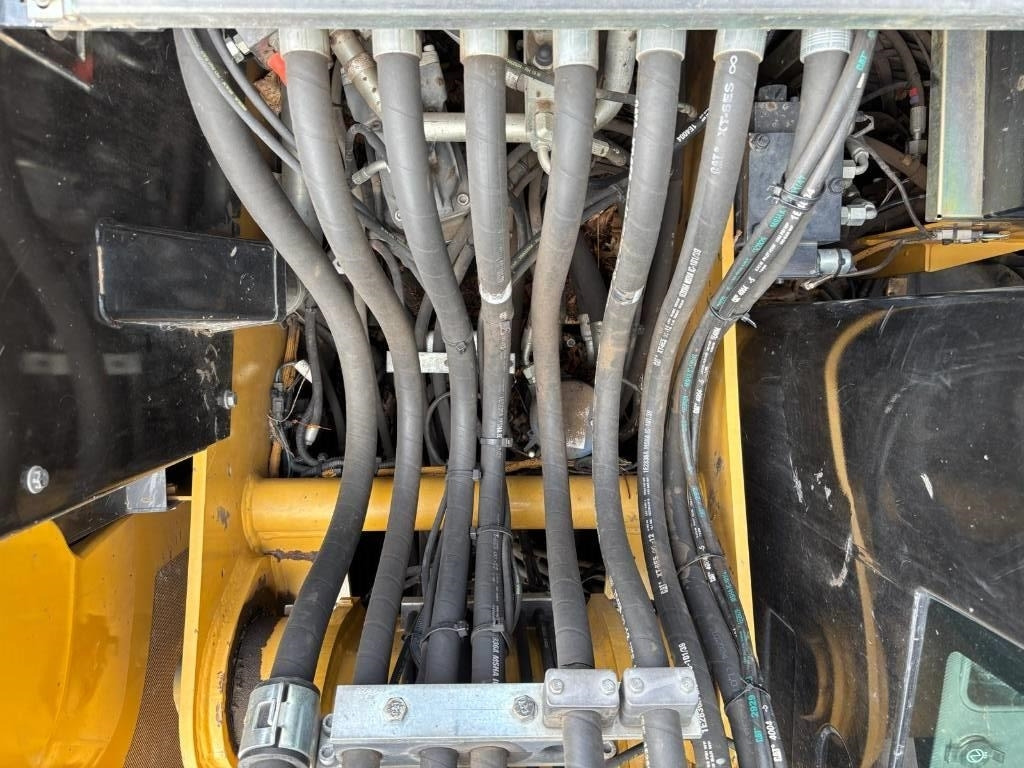 حفارة دولاب CAT M 313 D: صورة 20