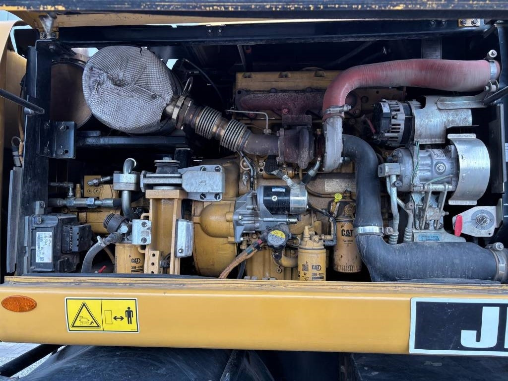 حفارة دولاب CAT M 313 D: صورة 16