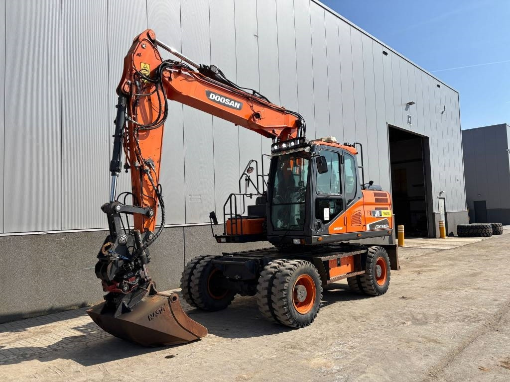 Doosan DX 140 W-5 (R5 Rototilt) - حفارة دولاب: صورة 2 Doosan DX 140 W-5 (R5 Rototilt) - حفارة دولاب: صورة 2