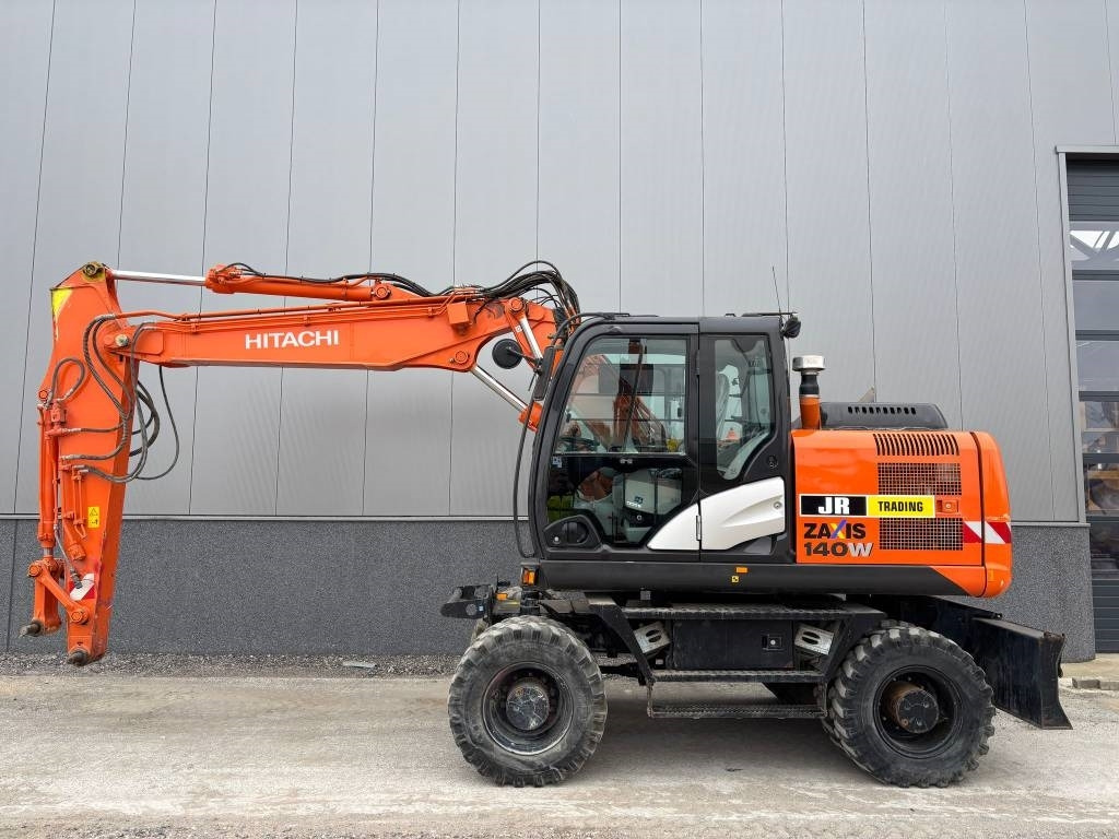 Hitachi ZX 140 W-5B - حفارة دولاب: صورة 1 Hitachi ZX 140 W-5B - حفارة دولاب: صورة 1