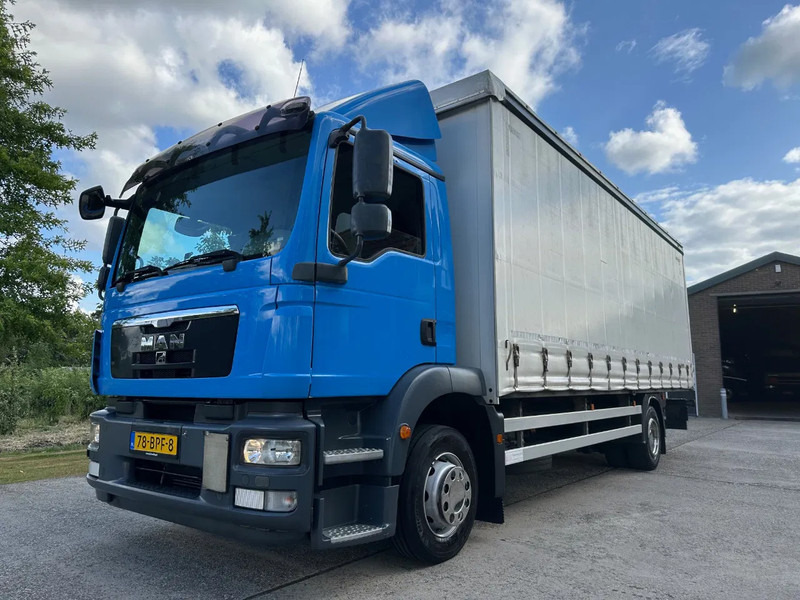 MAN TGM 15.250 / NL TRUCK / EURO 5 / SLIDING ROOF / BOX + TAILLIFT / FULL AIR / NAVI - شاحنة مقفلة: صورة 1 MAN TGM 15.250 / NL TRUCK / EURO 5 / SLIDING ROOF / BOX + TAILLIFT / FULL AIR / NAVI - شاحنة مقفلة: صورة 1
