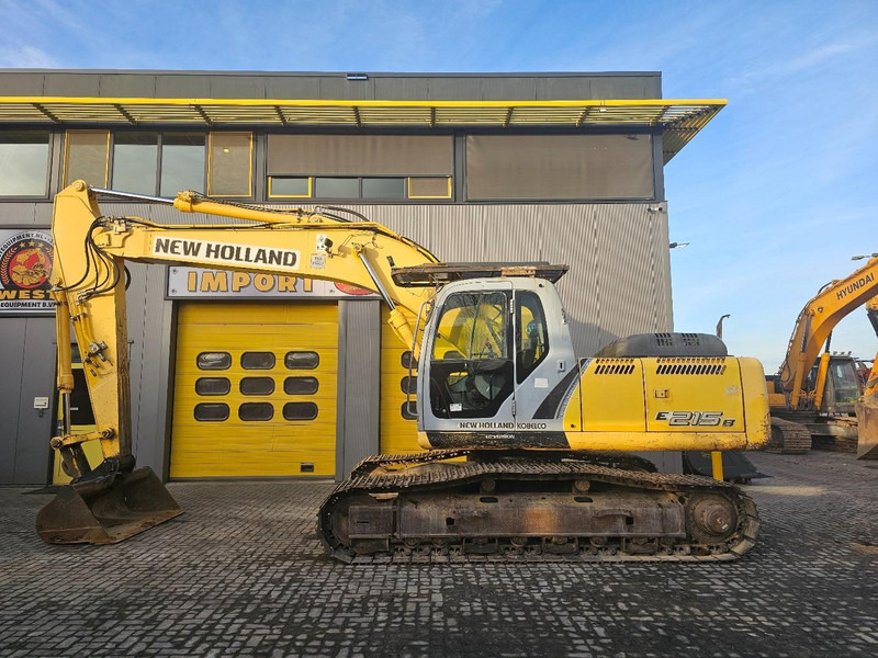 New Holland E215B - حفار زحاف: صورة 1 New Holland E215B - حفار زحاف: صورة 1