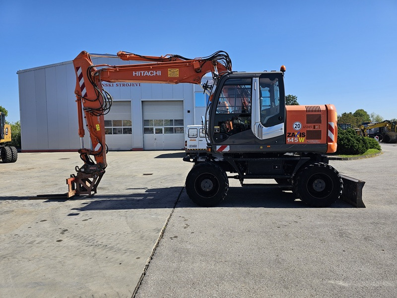 HITACHI ZX145W-3 - حفارة دولاب: صورة 1 HITACHI ZX145W-3 - حفارة دولاب: صورة 1