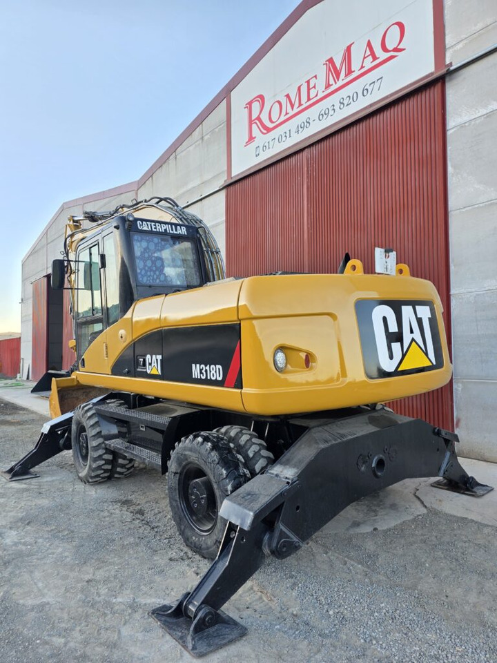 CAT M318D - حفارة دولاب: صورة 2 CAT M318D - حفارة دولاب: صورة 2