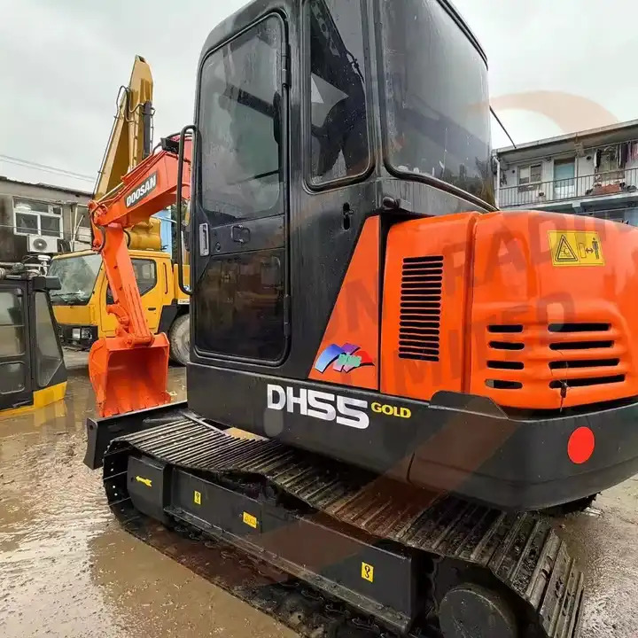 Cheap used mini excavator machine Crawler DH55 Factory sale used excavator used machinery doosan DH55 Used mini excavator - حفارة: صورة 2 Cheap used mini excavator machine Crawler DH55 Factory sale used excavator used machinery doosan DH55 Used mini excavator - حفارة: صورة 2