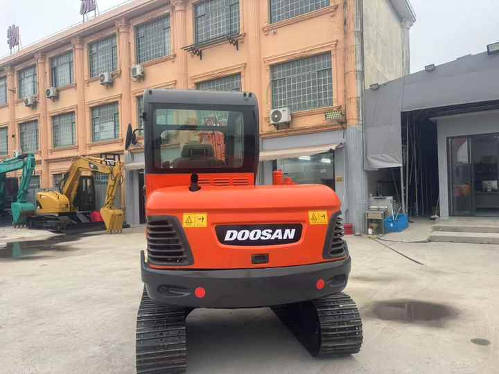 Doosan DX60 DX60-9c DH60-7 DX60W DX80 DX75 DX55 DH35 DH55 Used Mini Excavator Mas Maquinaria Municipal Y Ambiental - حفارة: صورة 5 Doosan DX60 DX60-9c DH60-7 DX60W DX80 DX75 DX55 DH35 DH55 Used Mini Excavator Mas Maquinaria Municipal Y Ambiental - حفارة: صورة 5