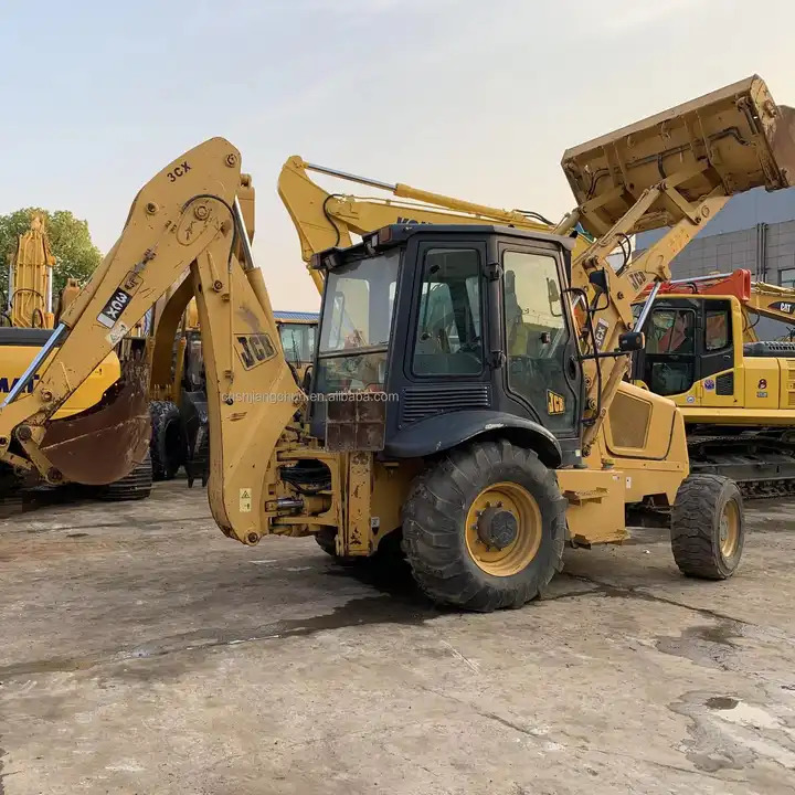 High Quality Original Uk JCB 3CX excavator used wheel loaders 7 ton backhoe loader with good working condition in stock for sale - جرافة حفار: صورة 1 High Quality Original Uk JCB 3CX excavator used wheel loaders 7 ton backhoe loader with good working condition in stock for sale - جرافة حفار: صورة 1