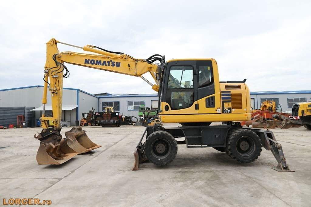 Komatsu PW 148-10 - حفارة دولاب: صورة 1 Komatsu PW 148-10 - حفارة دولاب: صورة 1