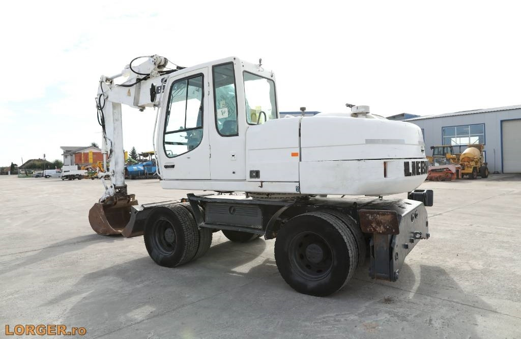 Liebherr A 316 Litronic - حفارة دولاب: صورة 2 Liebherr A 316 Litronic - حفارة دولاب: صورة 2