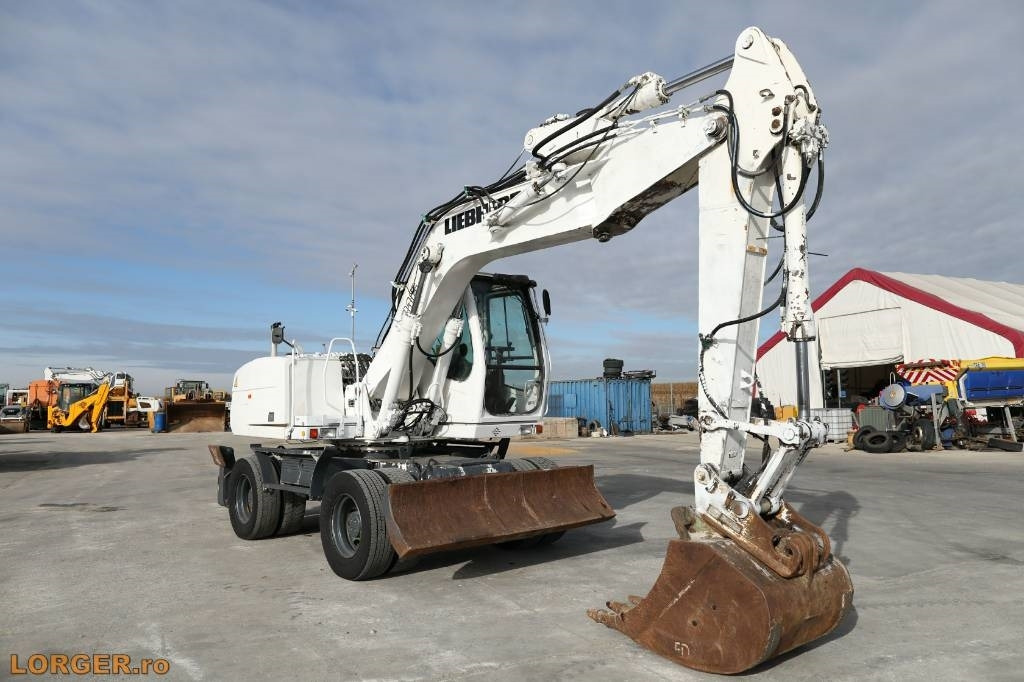 Liebherr A 316 Litronic - حفارة دولاب: صورة 4 Liebherr A 316 Litronic - حفارة دولاب: صورة 4