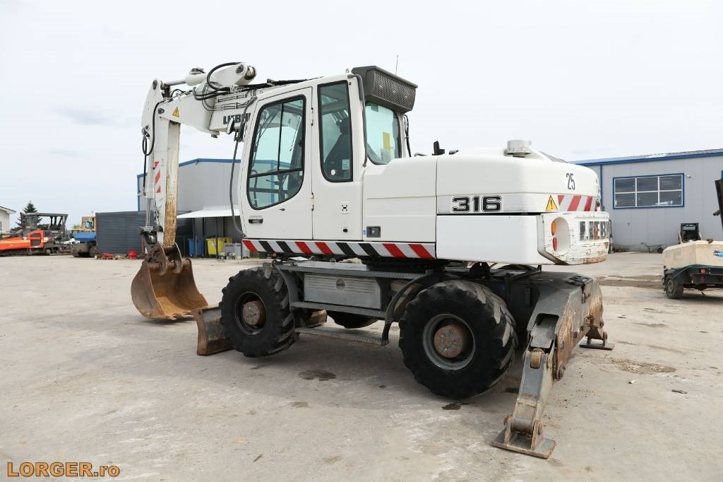 Liebherr A 316 Litronic - حفارة دولاب: صورة 3 Liebherr A 316 Litronic - حفارة دولاب: صورة 3