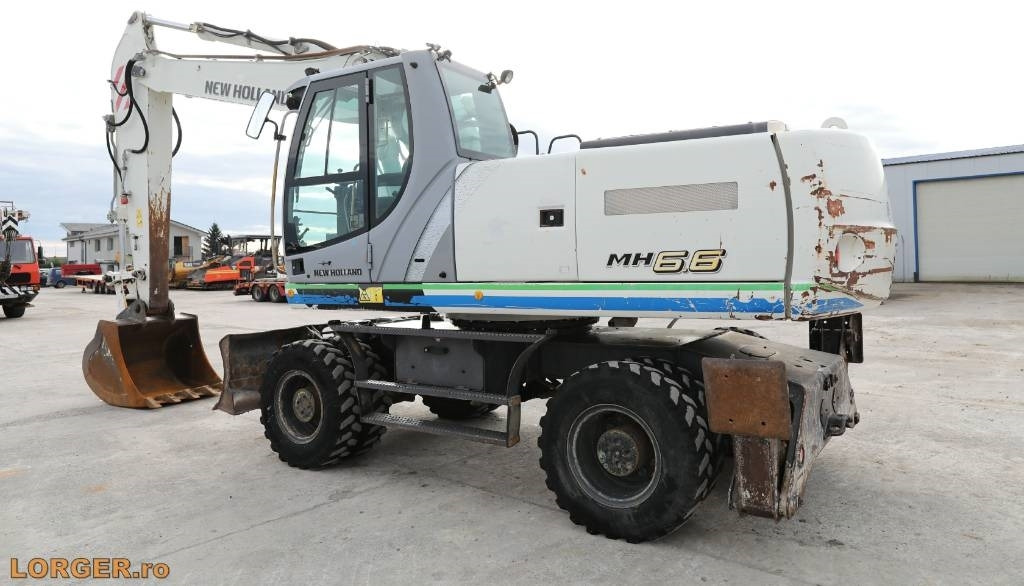New Holland MH 6.6 + Sandvic Hammer  - حفارة دولاب: صورة 3 New Holland MH 6.6 + Sandvic Hammer  - حفارة دولاب: صورة 3