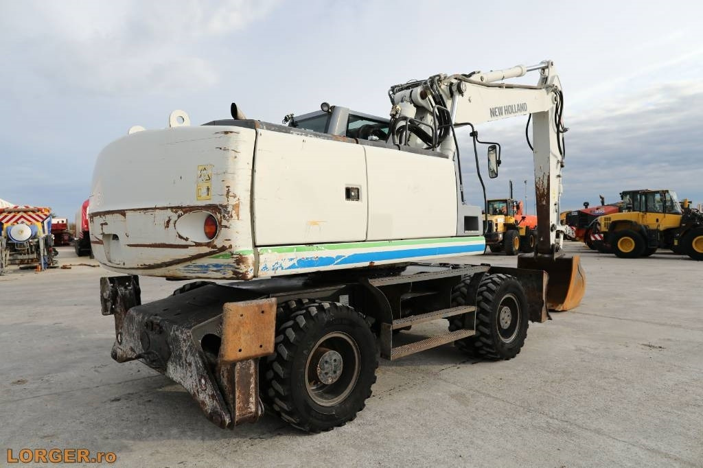 New Holland MH 6.6 + Sandvic Hammer  - حفارة دولاب: صورة 4 New Holland MH 6.6 + Sandvic Hammer  - حفارة دولاب: صورة 4