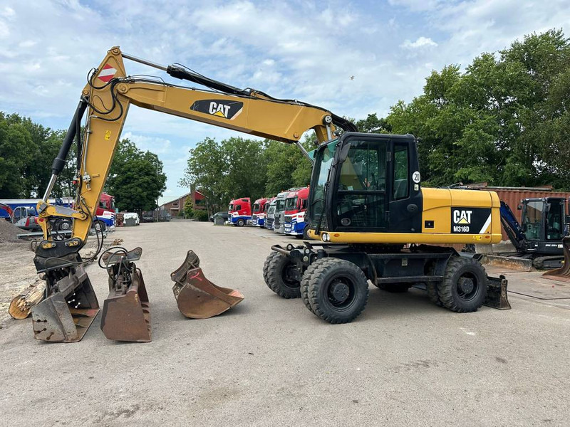 Cat M 316 D - حفارة دولاب: صورة 2 Cat M 316 D - حفارة دولاب: صورة 2