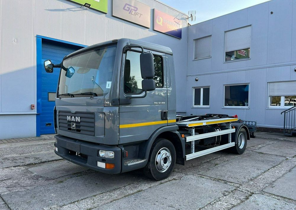 MAN TGL 12.180, hakowiec Janco/GP Lift - شاحنة النفايات: صورة 1 MAN TGL 12.180, hakowiec Janco/GP Lift - شاحنة النفايات: صورة 1