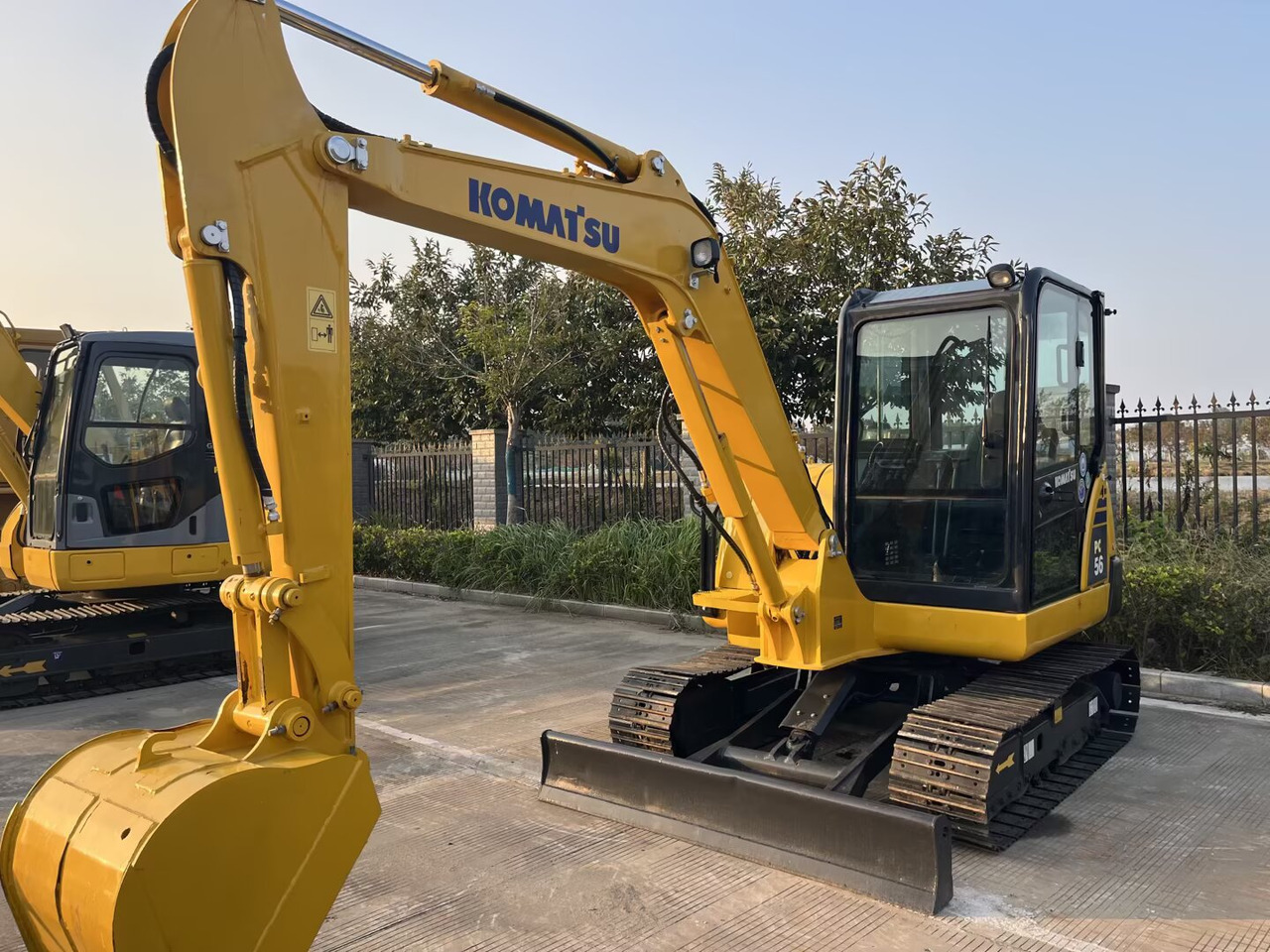 Komatsu PC56 - حفارة مُصَّغرة: صورة 1 Komatsu PC56 - حفارة مُصَّغرة: صورة 1