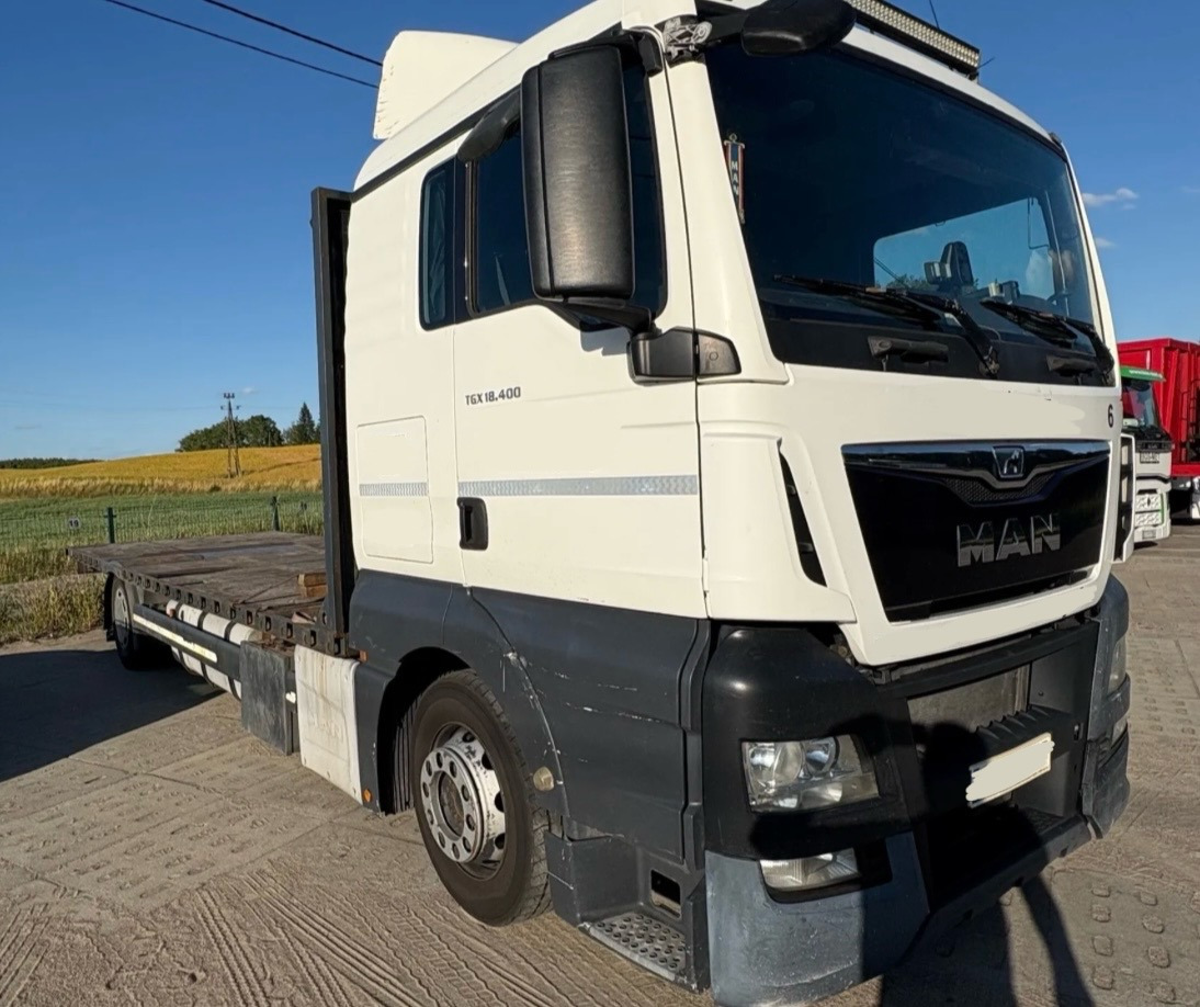 MAN TGX 18.400 / PLATFORMA / 630 TYŚ KM / 2015 ROK / SYPIALKA - شاحنات مسطحة: صورة 1 MAN TGX 18.400 / PLATFORMA / 630 TYŚ KM / 2015 ROK / SYPIALKA - شاحنات مسطحة: صورة 1