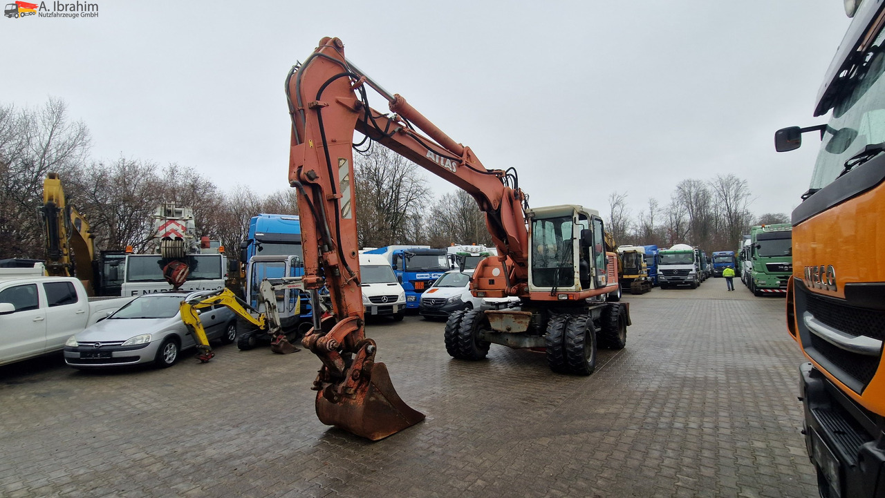 Atlas 1604K Verstellausleger - حفارة دولاب: صورة 1 Atlas 1604K Verstellausleger - حفارة دولاب: صورة 1