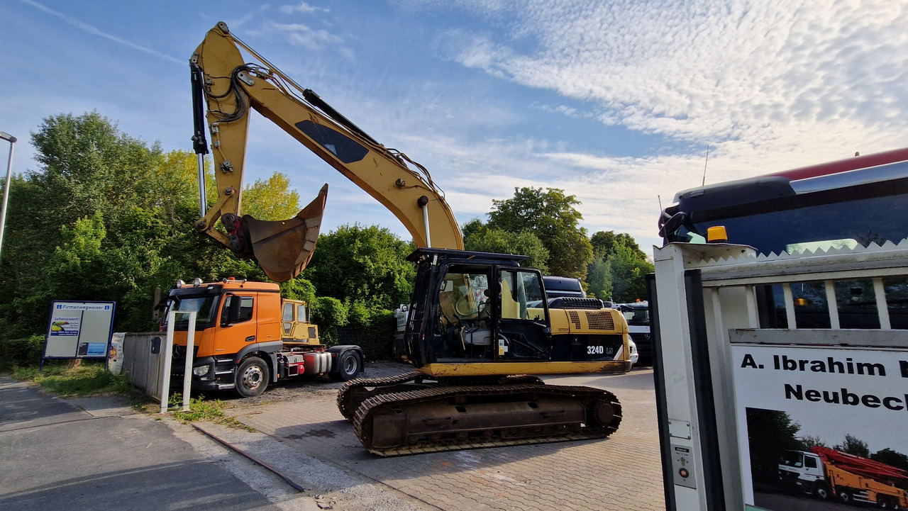 CAT 324 D Deutsche Maschine | Schnellwechsler | Löffel | Hammerhydraulik | 8016h original - حفار زحاف: صورة 1 CAT 324 D Deutsche Maschine | Schnellwechsler | Löffel | Hammerhydraulik | 8016h original - حفار زحاف: صورة 1
