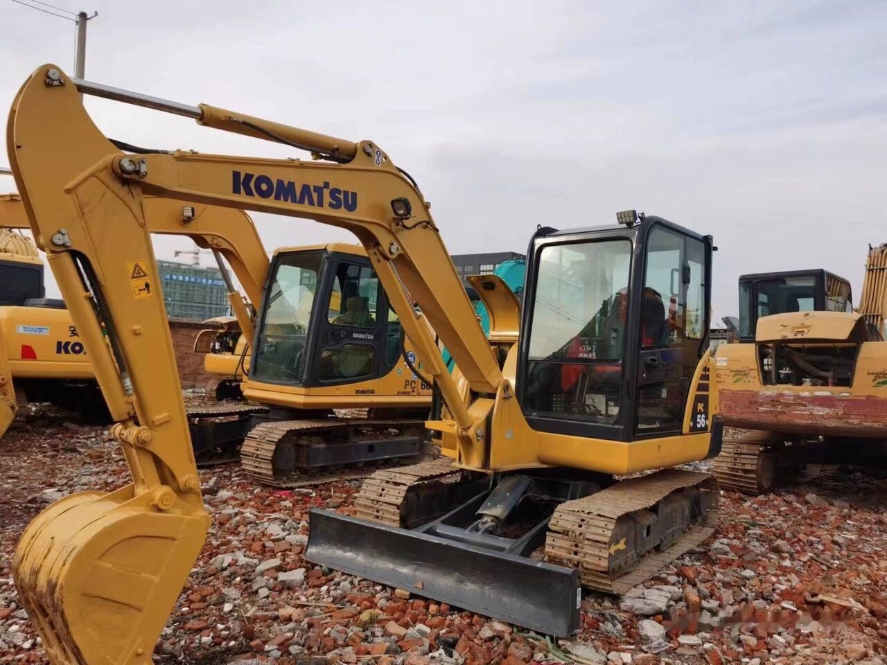 Komatsu PC56 - حفارة مُصَّغرة: صورة 2 Komatsu PC56 - حفارة مُصَّغرة: صورة 2