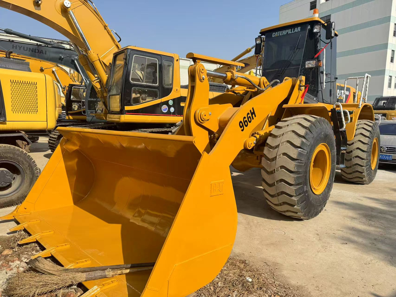 CATERPILLAR 966H - اللودر بعجل: صورة 1 CATERPILLAR 966H - اللودر بعجل: صورة 1