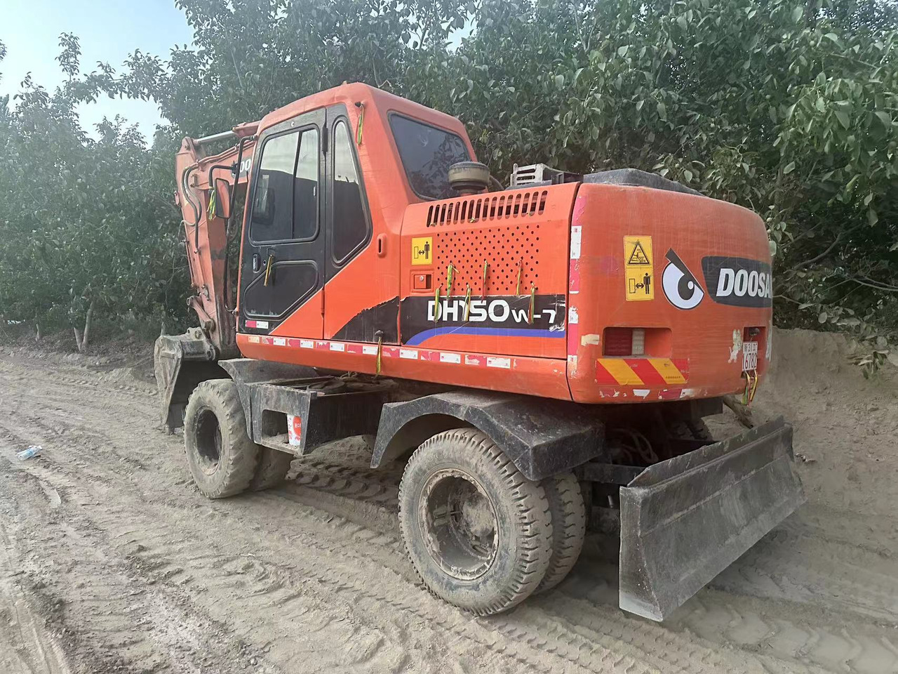 DOOSAN DH150W-7 - حفارة دولاب: صورة 1 DOOSAN DH150W-7 - حفارة دولاب: صورة 1