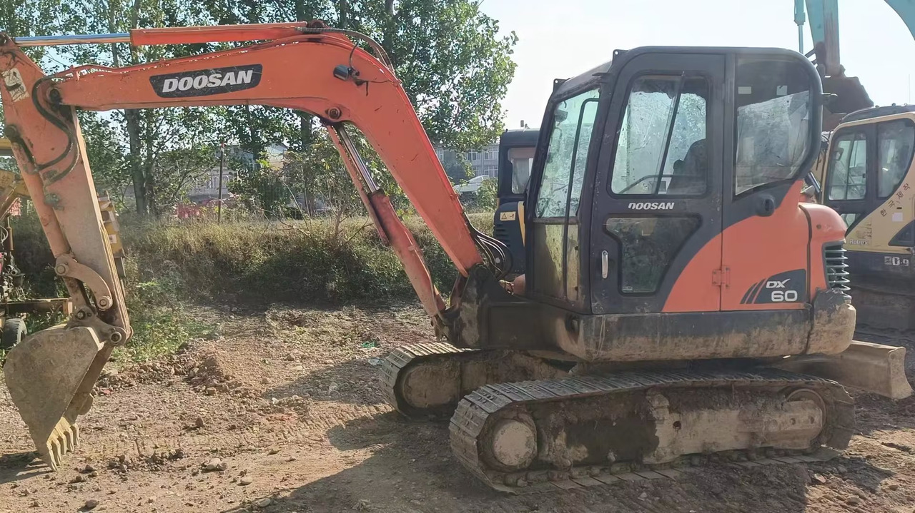 DOOSAN dx60 - حفارة مُصَّغرة: صورة 1 DOOSAN dx60 - حفارة مُصَّغرة: صورة 1