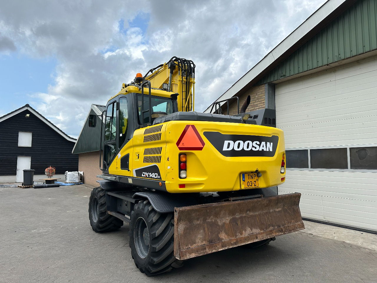 Doosan DX140W-5 - حفارة دولاب: صورة 4 Doosan DX140W-5 - حفارة دولاب: صورة 4
