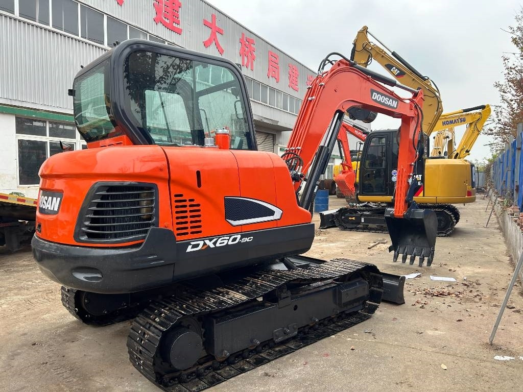 Doosan DX 60 - حفارة مُصَّغرة: صورة 1 Doosan DX 60 - حفارة مُصَّغرة: صورة 1