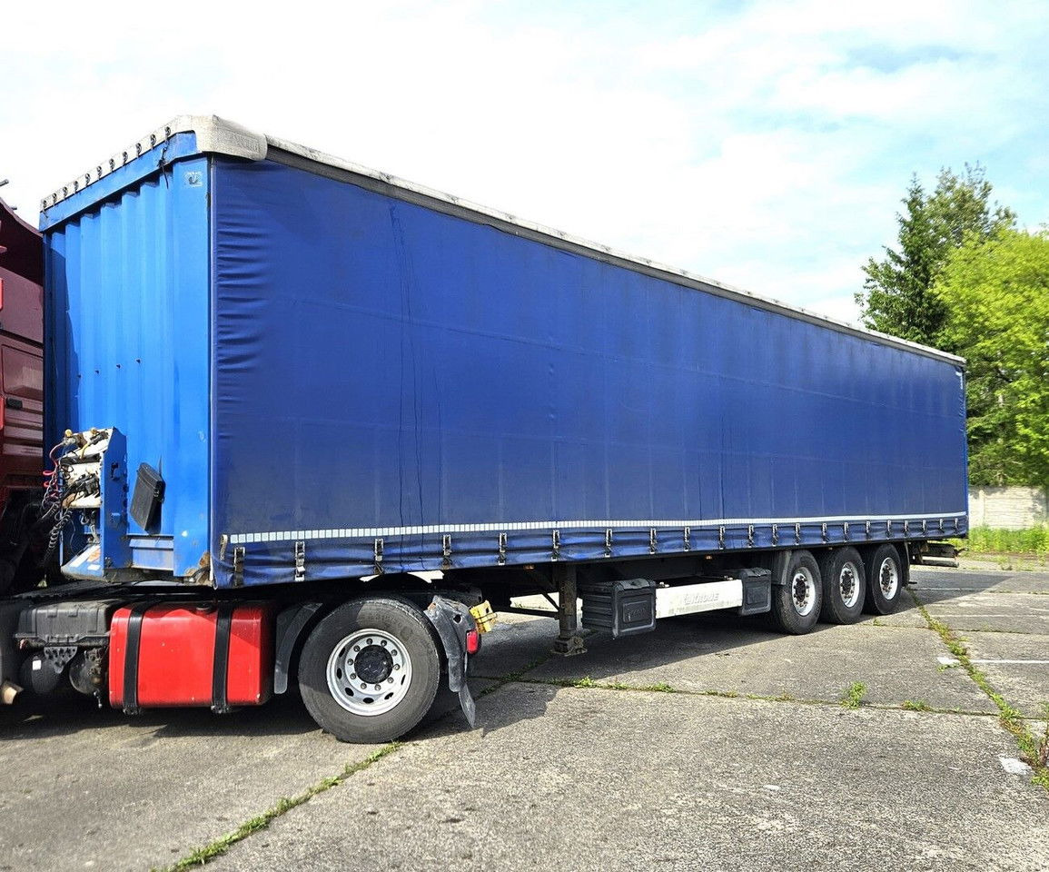 Krone SD - Axles SAF - نصف مقطورة ستارة: صورة 1 Krone SD - Axles SAF - نصف مقطورة ستارة: صورة 1