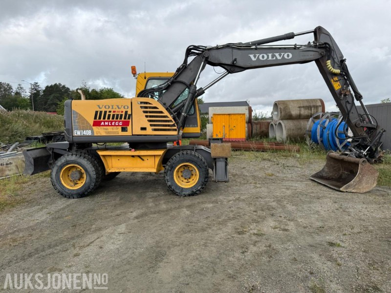 2006 Volvo EW140B Hjulgraver m/pallegaffel og skuff - Steelwrist tiltrotator. - حفارة: صورة 3 2006 Volvo EW140B Hjulgraver m/pallegaffel og skuff - Steelwrist tiltrotator. - حفارة: صورة 3