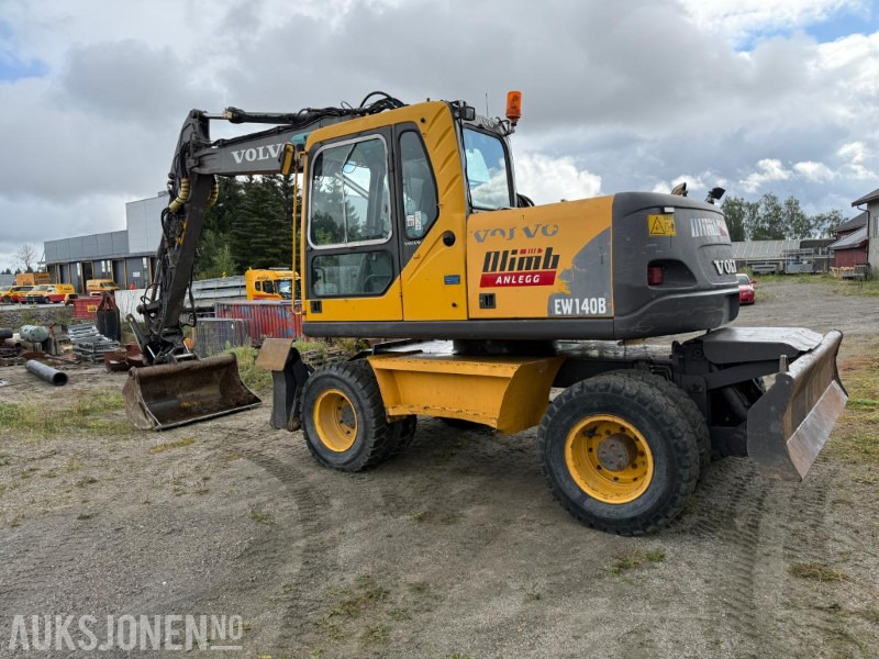 2006 Volvo EW140B Hjulgraver m/pallegaffel og skuff - Steelwrist tiltrotator. - حفارة: صورة 5 2006 Volvo EW140B Hjulgraver m/pallegaffel og skuff - Steelwrist tiltrotator. - حفارة: صورة 5